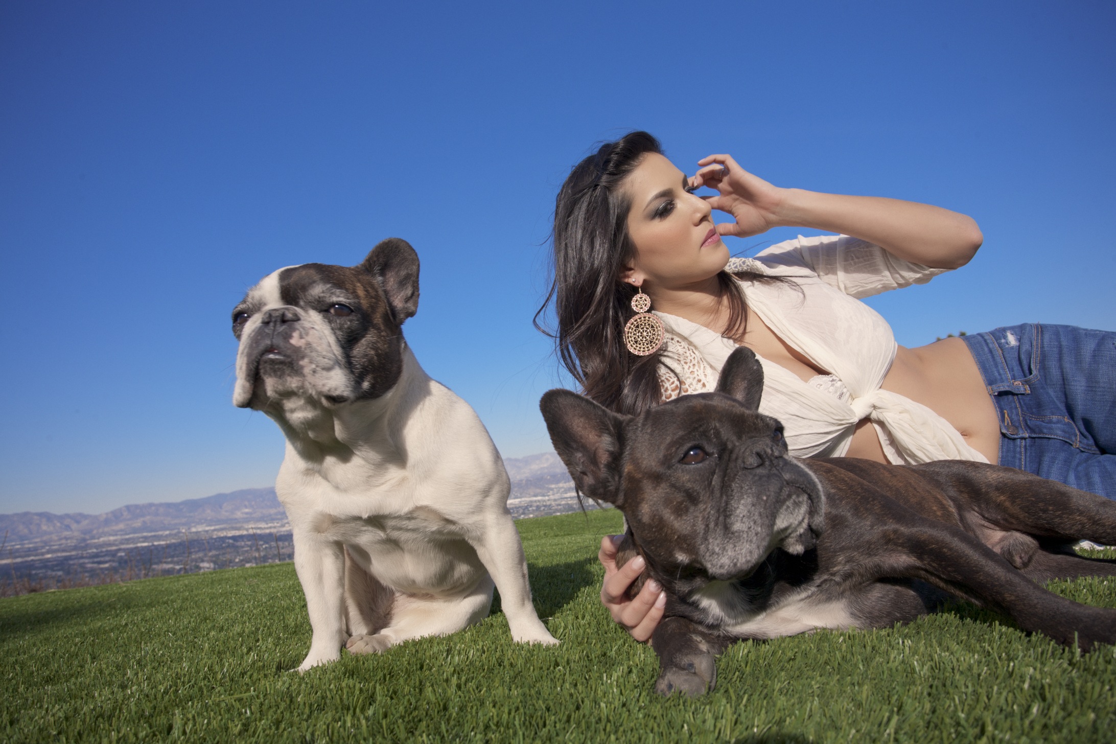Sunny Leone Playing With Her Puppies